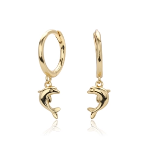Detail of golden dolphin hoop earrings with a polished finish and drop design