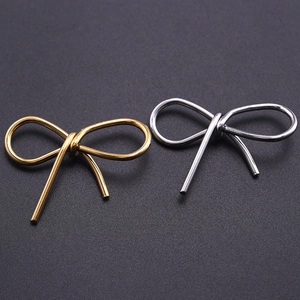 Pendentifs nœuds en acier inoxydable 304 dorés et argentés pour la création de bijoux