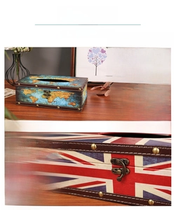 Detail showing vintage leather tissue box with Union Jack design and metal lock buckle