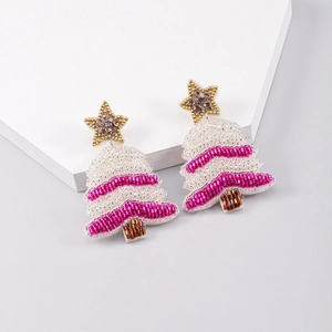 Handmade beaded Christmas tree earrings in white and rose red with gold star detail