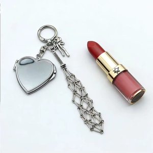 Silver metal keychain with heart locket mirror and decorative mesh chain for lipstick pouch