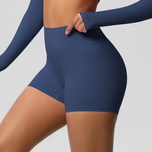Detailed view of seamless high-waisted navy blue yoga shorts with wide tummy control waistband