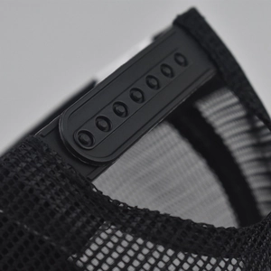 Close-up of the adjustable plastic snapback strap and breathable mesh on a baseball cap