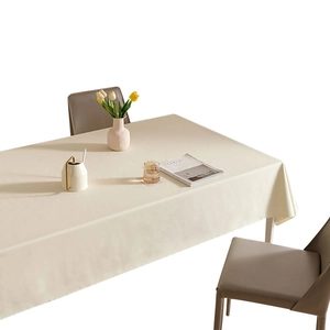 Creamy white waterproof faux leather tablecloth with elegant drape for dining room