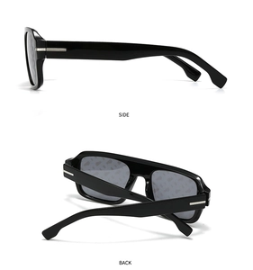 Detail view of square sunglasses featuring signature silver metal hinge and polished black frames