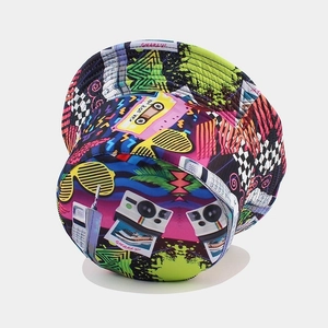 Retro reversible bucket hat featuring vintage 90s cassette and camera graphic patterns