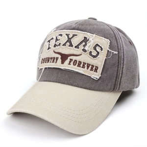 Detail of vintage washed baseball cap with Texas embroidery and frayed patch design