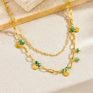 Double layered gold plated stainless steel necklace featuring green natural stone pendants