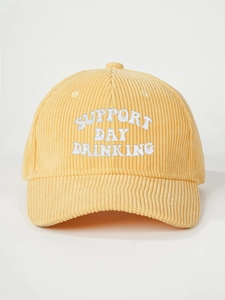 Detailed close-up of white 'SUPPORT DAY DRINKING' embroidery on yellow corduroy baseball cap