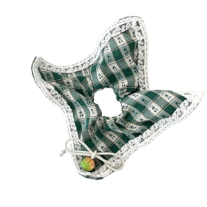 Green and white checkered hair scrunchie with lace trim and decorative orange bead detail