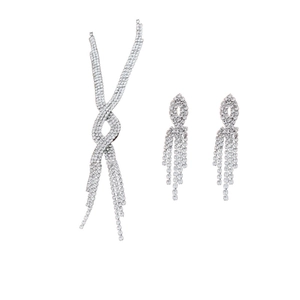 Elegant silver tassel necklace and earrings set with sparkling rhinestones on white background