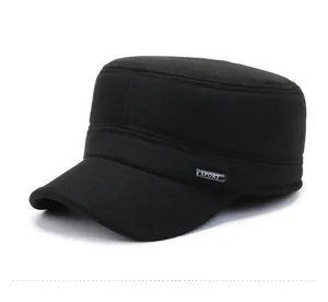 Detail view of black men's winter military cap with silver metal SPORT emblem