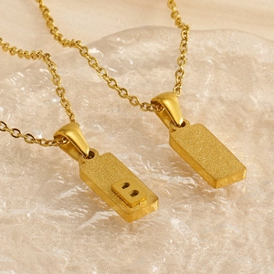 Gold stainless steel rectangle necklace with letter B pendant and textured finish