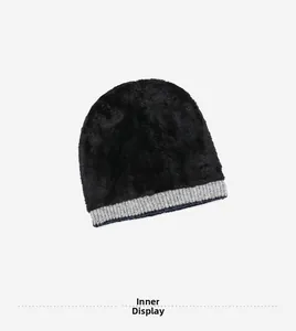 Detailed view of the thick black plush lining and grey ribbed knit edge for winter warmth