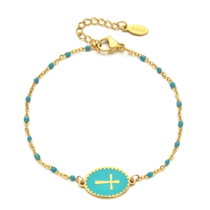 Detail of gold stainless steel bracelet with blue enamel cross charm and beads