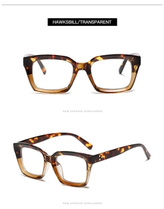 Detail of square oversized eyewear frames in hawksbill and transparent gradient with rivets