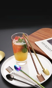 Macro detail of multi-color 304 stainless steel straw spoons with creative square head design