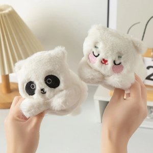 Detail of plush animal hair accessories featuring cute panda and bear embroidery