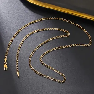 Detail of adjustable gold-plated stainless steel chain with secure lobster clasp closure