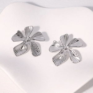 Exaggerated 18K gold plated silver flower earrings with textured petals for women