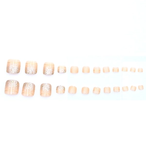 Classic nude pink press-on toenails with silver glitter gradient and gold lines
