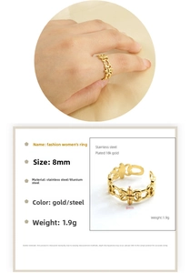 Detailed view of 8mm hollow floral 18K gold plated stainless steel ring specifications