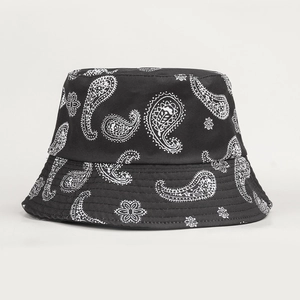 Reversible paisley bucket hat in black and white for sun protection and outdoor styling