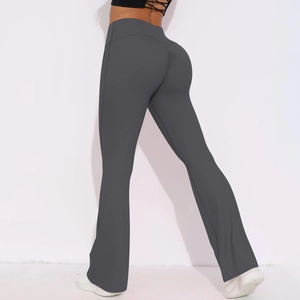 Detail view of high waisted dark gray yoga pants featuring scrunch butt lifting design