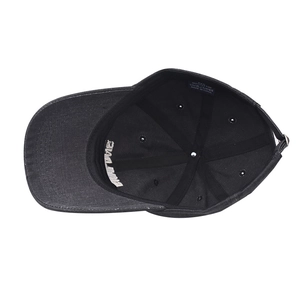 Detail view of cotton baseball cap interior showing six-panel stitch and metal buckle