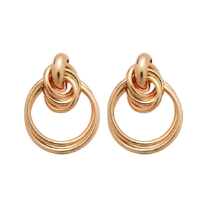 Minimalist gold tiered circular hoop earrings with a polished finish and vintage style