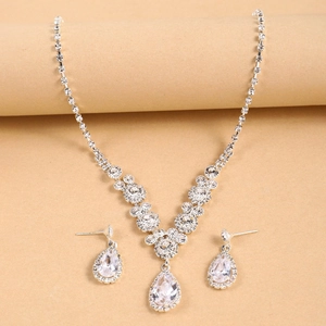 Elegant silver jewelry set with pear-cut rhinestones including necklace and earrings