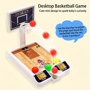 Mini desktop basketball game with scoreboard and dynamic ball trajectory visualization