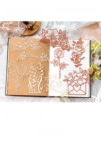 Detailed view of hollow lace-cut floral decorative paper for vintage junk journaling craft