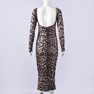 Back view of leopard print long sleeve bodyless dress showing the deep open back design