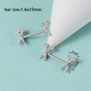 Detail of silver scissors nipple rings with zircons on a cone, 1.6x15mm bar size