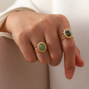 Vintage titanium steel open rings with green natural stones for women on model hands