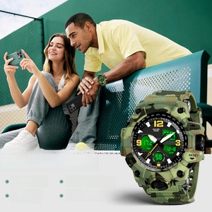 Detail of green camouflage digital watch with plastic strap in a lifestyle sports setting
