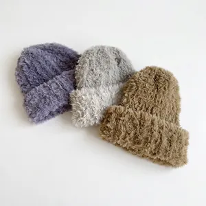 Women's minimalist plush knitted beanie hats in purple, grey, and brown winter set