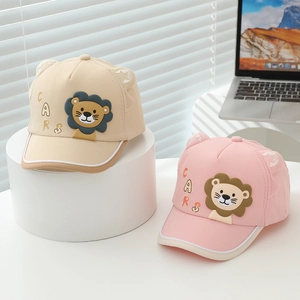 Detail of cute lion baseball cap showing 3D ears and Cars embroidery for toddlers