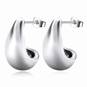 Detailed close-up of smooth polished silver stainless steel teardrop earrings on white