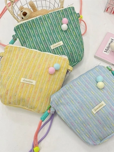 Macaron woven crossbody phone bag with colorful pompoms and adjustable strap