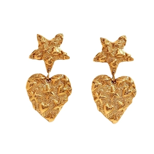 Vintage irregular golden earrings featuring star and heart embossed textured metal patterns