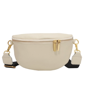 Minimalist beige lychee grain leather waist bag with gold zippers and wide nylon strap