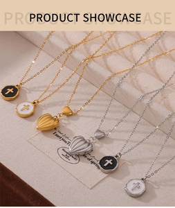 Detail of vintage heart pendants and cross round medals on gold and silver necklaces