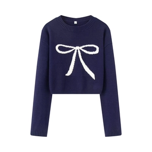 Navy blue cropped knit sweater for women featuring a large white contrast bow design