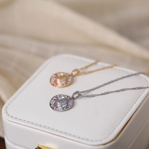 Pink western cowboy hat pendant necklace in gold and silver finish with enamel and gems