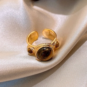 Verstellbarer goldener Tigerauge-Ring mit Zirkonia-Steinen und Seilstruktur-Band