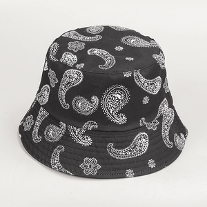 Reversible black paisley bucket hat for men and women with white star flower patterns