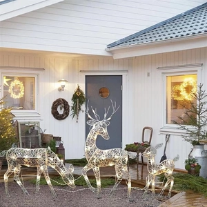 Three-piece warm gold LED lighted Christmas reindeer set for outdoor yard decoration