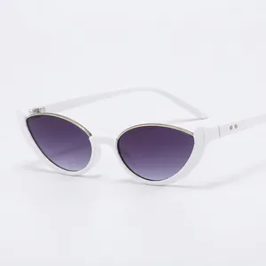 White cat-eye sunglasses with purple gradient lenses and gold metal trim details